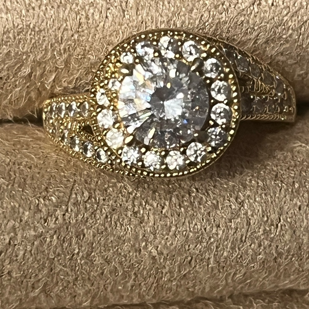 Simulated diamond ring. Gold plated size 6